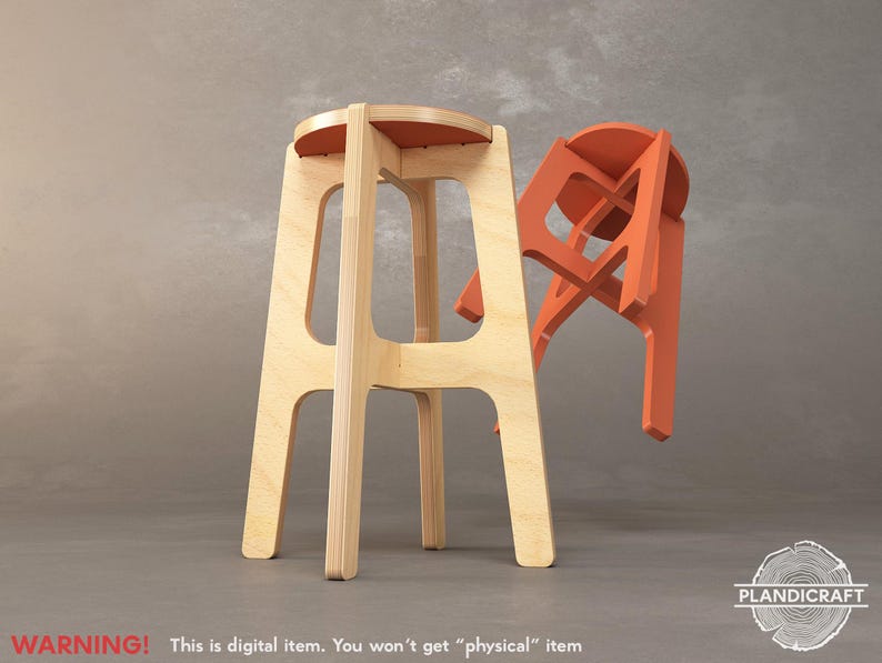 May include: A wooden stool with a natural finish and a round seat. The stool is made of plywood and has a simple, modern design. The stool is shown next to a smaller, orange-coloured stool.