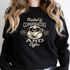 Fueled by Conspiracies & Coffee Sweatshirt Sarcastic Saying Shirt Conspiracy Theory Tshirt Gift for Conspiracy Theorist Coffee Lover Sweater