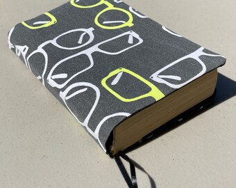 The Book Cozy, Book Cover, Mass Market, Reversible, Reusable, Washable Fabric, Built in bookmark, Black - Glasses