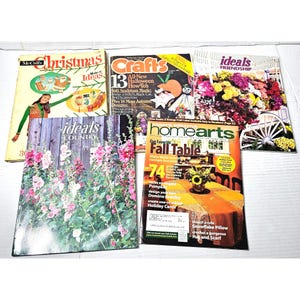 May include: A collection of vintage craft magazines, including McCall's Christmas Ideas, Crafts, Ideals Friendship, Ideals Country, and HomeArts. The magazines feature a variety of craft projects, including holiday decorations, home decor, and jewelry.