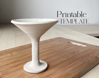 May include: A white ceramic martini glass on a wooden cutting board. Printable TEMPLATE text is visible in the top right corner of the image.