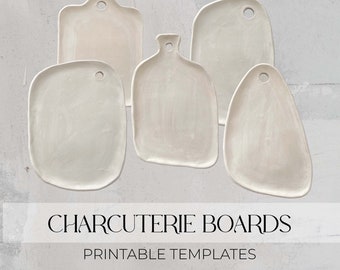 May include: Five white ceramic charcuterie boards of different shapes and sizes. The boards have a rustic, handmade look and are perfect for serving cheese, crackers, and other appetizers. Printable templates.