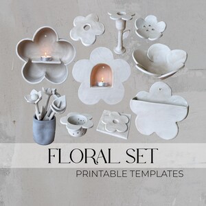 May include: A collection of off-white, flower-shaped ceramic home decor items. The set includes candle holders, shelves, a vase with flowers, and a small dish. The text "FLORAL SET PRINTABLE TEMPLATES" is displayed at the bottom of the image.