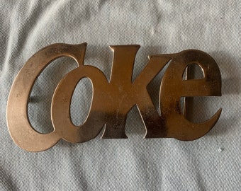 Belt Buckle Coke