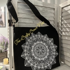 Black canvas cross-body bag with mandala design