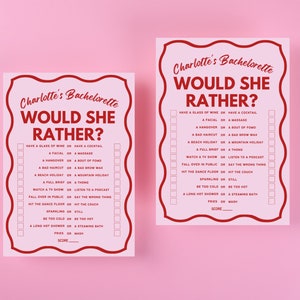 May include: Two pink printable game cards with red text that reads "Charlotte's Bachelorette Would She Rather?" with a list of questions to answer. The questions are in the form of "Would you rather have a glass of wine or a cocktail?" or "Would you rather have a facial or a massage?"