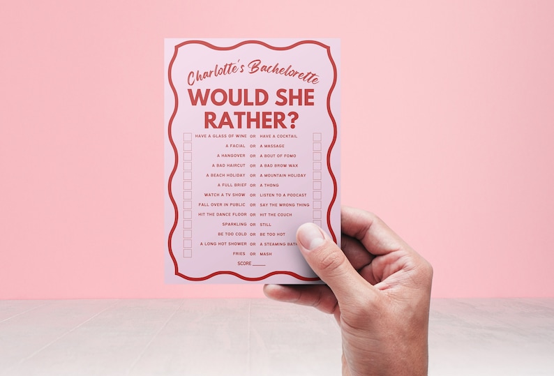 May include: A pink card with the text "Charlotte's Bachelorette Would She Rather?" and a list of questions with checkboxes. The card is held in a hand.