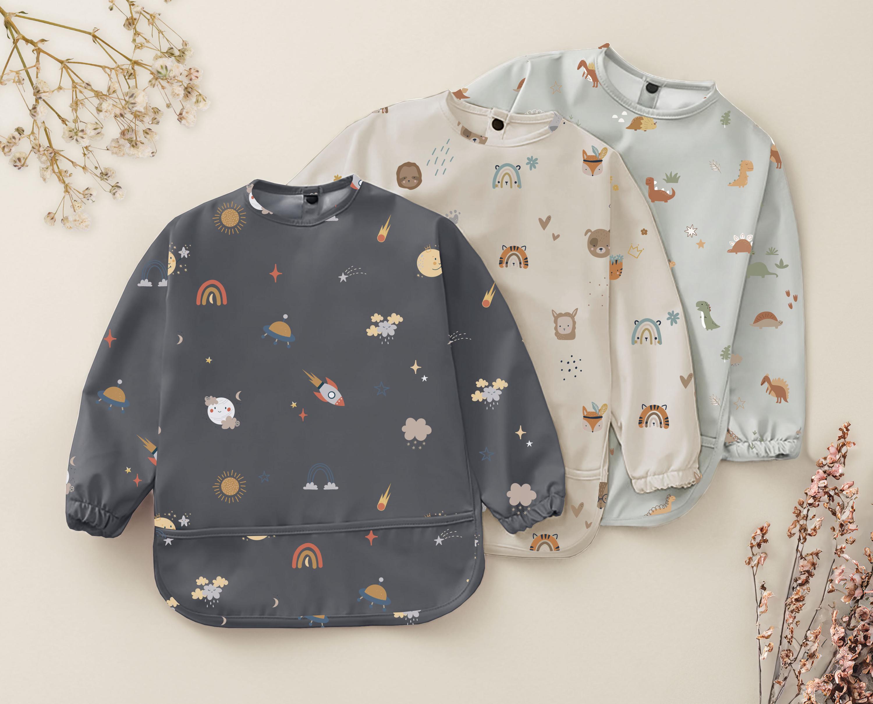 Liewood MERLE CAPE BIB JUNGLE/APPLE BLOSSOM MIX Liewood MERLE CAPE BIB JUNGLE/APPLE BLOSSOM MIX