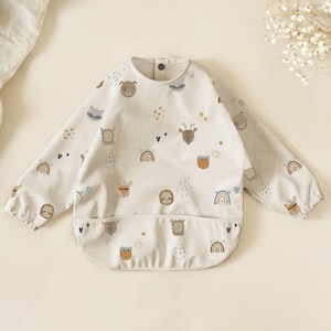リサイクルポリエステル製の赤ちゃんと幼児用のコレクションポケット付き袖よだれかけ、ベルリンのデザイン、離乳食の誕生、誕生日の開始のためのギフト