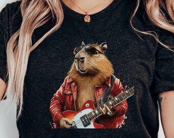 May include: A dark grey t-shirt with a graphic of a capybara wearing sunglasses and a red leather jacket, playing an electric guitar.