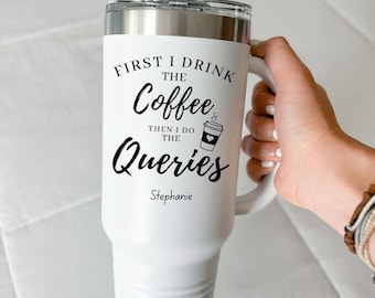 May include: A white stainless steel tumbler with a handle and a clear lid. The tumbler features black text that reads: FIRST I DRINK THE Coffee THEN I DO THE Queries, followed by the name Stephanie and a small graphic of a coffee cup with a heart.
