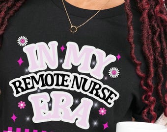 May include: Black t-shirt with the text "IN MY REMOTE NURSE ERA" in white and pink. The shirt also features daisy and star graphics. A white mug with the text "TODAY'S Good Mood IS SPONSORED BY Coffee" is visible.