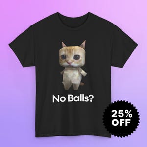 May include: Black t-shirt featuring a cartoon cat with the text "No Balls?" in white. The cat has a blocky design with tan and white fur. A black sticker with "25% OFF" is in the bottom right corner.