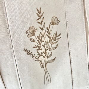 Engraved flowers on a garden bag