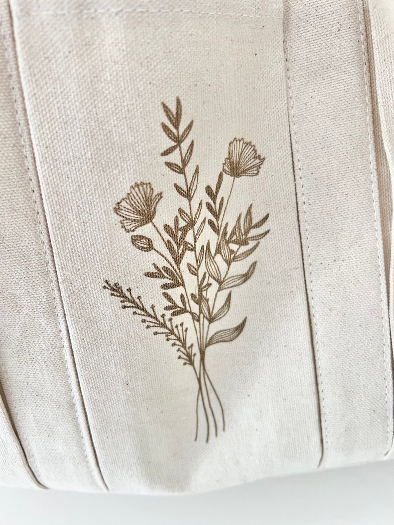 Engraved flowers on a garden bag