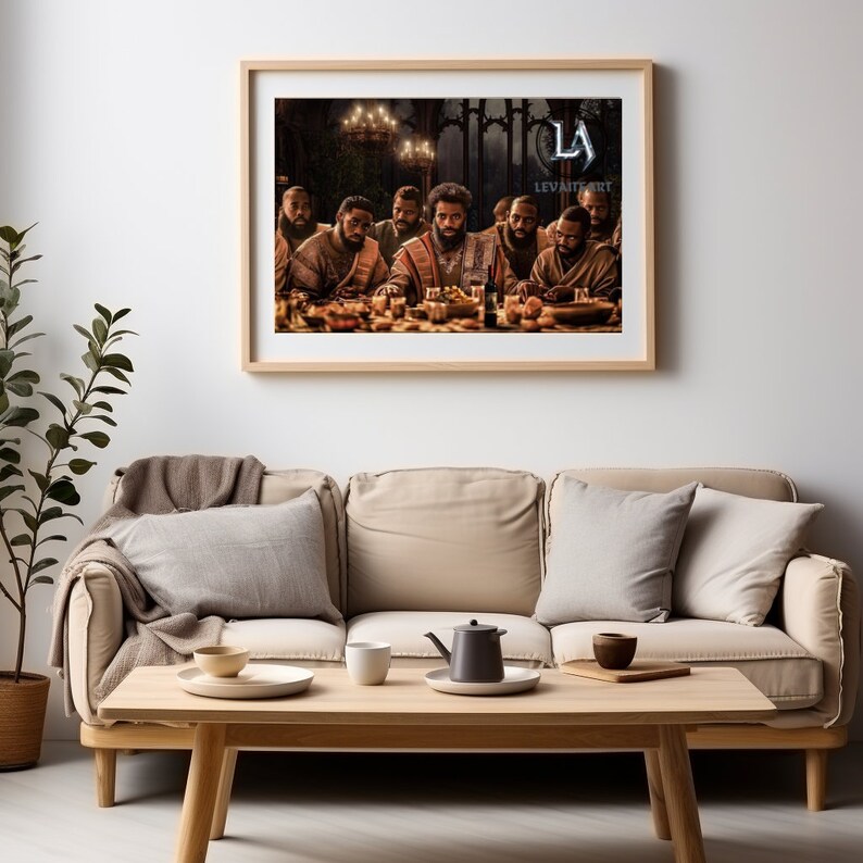 May include: A framed print depicting a group of men gathered around a table, illuminated by soft lighting. The artwork features a warm color palette with detailed figures and a historical theme. The print is displayed above a light-colored sofa in a living room setting.