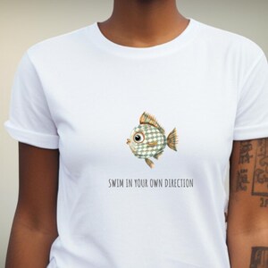 Quirky Fish Lover T-Shirt, Inspirational "Swim in Your Own Direction" Quote, Fun Casual Graphic Tee, Ideal Gift For Fish Lover
