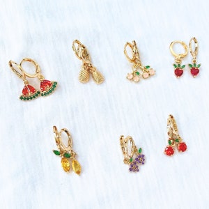 Our fruit hoop earrings pineapple earrings, grape jewelry, cherry earrings, watermelon earrings and strawberry earrings hoop. These delightful accessories is a perfect daughter present, for a plant mom or anyone who loves playful and stylish jewelry.