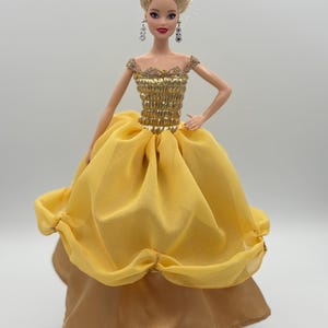 11.5” Barbie doll Golden dress