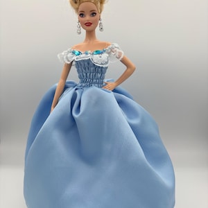 May include: A rustic wooden sign with the text "Welcome to our home" in a handwritten style. The sign features a distressed finish and a simple, inviting design, perfect for entryway decor.