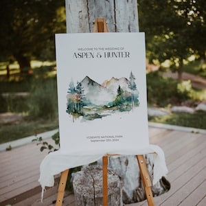 Letrero de bienvenida para boda en la montaña, póster de bosque de pinos editable, tablero imprimible, plantilla de Canva, letrero de recepción en acuarela - MO1