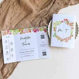 May include: A wedding invitation with a floral design. The invitation includes the names Matilda & Thomas, the date Saturday, March 14 20XX, and the location Cozy Estate. The invitation also includes a QR code for RSVP, gifts, and details.
