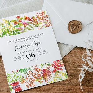 May include: A white wedding invitation with a floral design featuring red, orange, and yellow flowers. The invitation reads "You are invited to celebrate the engagement of Maddy + Josh" and includes the date and time of the event.