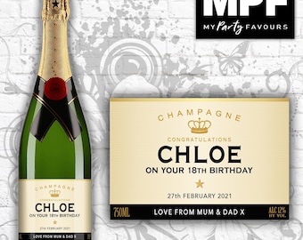 May include: Champagne bottle label with a gold crown and the text "Congratulations Chloe on your 18th Birthday 27th February 2021 Love from Mum & Dad X".