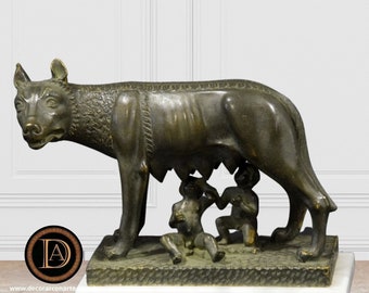Figure of the Capitoline Wolf. 7.87 x 5.79in. Patinated in imitation bronze. Molded marble. Handmade in Europe.