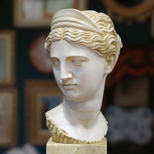 Head of Diana (Artemis). 13.78in. (35cm). Molded marble. Made in Europe