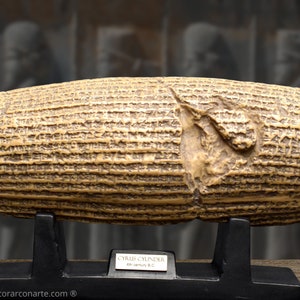 Cylinder of Cyrus. Width: 7.48 in (19 cm). Molded marble. Archaeological reproductions. Mesopotamian art. Handmade in Spain