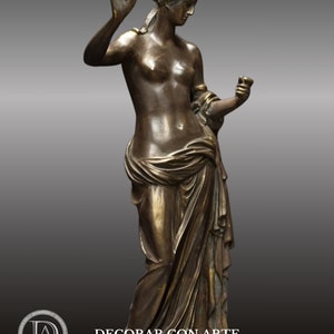 May include: Bronze sculpture of a woman standing with a draped garment, holding an apple in one hand and a cup in the other.
