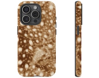 May include: A phone case with a brown and white spotted pattern, resembling animal fur. The case has a black camera module and side buttons. The design is visible on the front and side of the case.