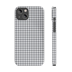 May include: A black and white gingham phone case for an iPhone.