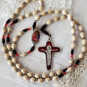 May include: A set of three ceramic mugs with a speckled, matte finish. Each mug features a different color: light blue, cream, and gray. The mugs have a simple, modern design and a comfortable handle. Perfect for coffee or tea.