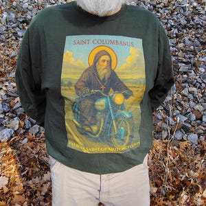 Cotton Long Sleeve Tee Motorcyclist Saint Design Comfortable Wear Premium Material Taped Shoulders No Side Seams Durable Construction Religious Biker Apparel Catholic Faith Expression Unisex Fit Classic Style Perfect Gift Idea Motorcycle