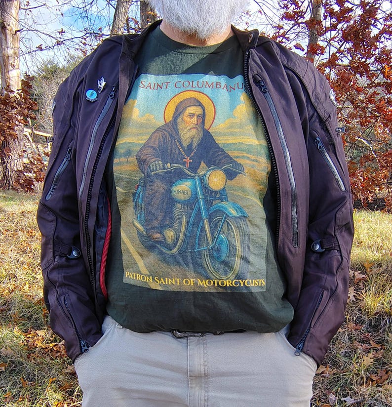 Motorcyclist Saint Shirt Long Sleeve Cotton Tee Religious Biker Catholic Apparel Comfortable Wear Durable Gift Christian Clothing Unisex Top Faith Expression Premium Material Classic Design Perfect Present Motorcycle Enthusiast Catholic