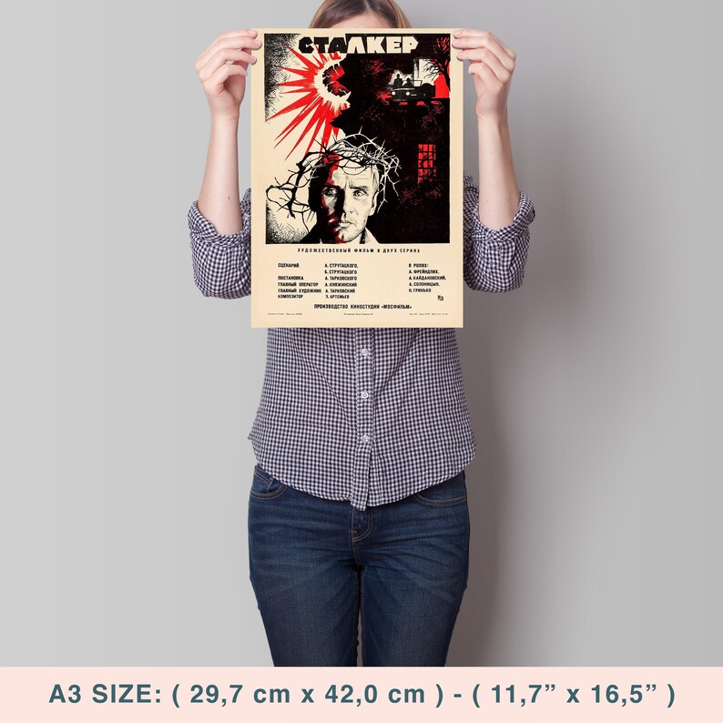 May include: A vintage movie poster for the film "Stalker" featuring a man with a crown of thorns and a red and black background. The poster is printed in Russian and includes the film's title, director, and cast.