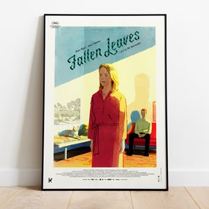 May include: A film poster for the movie "Fallen Leaves" featuring a woman in a red dress standing in a room with a man sitting on a sofa. The poster has a vintage style with a yellow, blue, and red colour scheme.