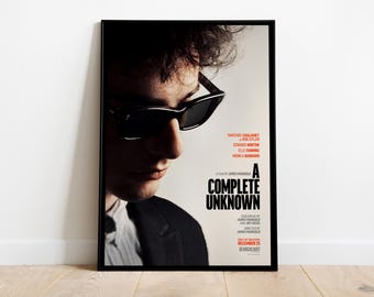 ティモシー・シャラメがボブ・ディランの未公開映画11x14写真にサイン