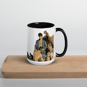 May include: White ceramic mug with a black rim and handle. The mug features a colourful illustration of three men in a woodland setting.