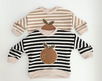 Oversized Sweater große Clementine, Pullover für Babys + Kinder aus Kuschelsweat mit Chenille-Patch, Streifen beige/ecru/schwarz
