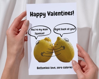 May include: A Valentine's Day card featuring two cartoon lemons hugging. The card reads "Happy Valentines!" with speech bubbles saying "You're my main Squeeze!" and "Right back at you!" The bottom reads "Bottomless love, zero calories."