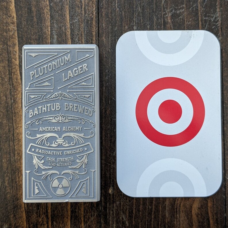 Custom metal tap handle with credit card for size reference