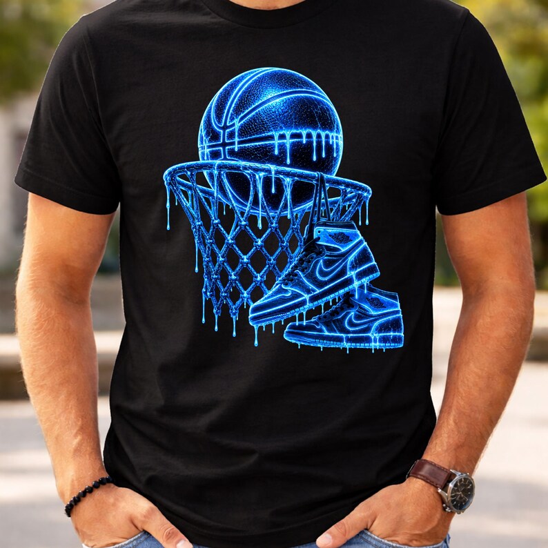 May include: A black t-shirt featuring a graphic of a glowing blue basketball and a basketball hoop with a net. A pair of high-top sneakers in the same glowing blue color hangs from the rim. The entire design has a dripping liquid effect.