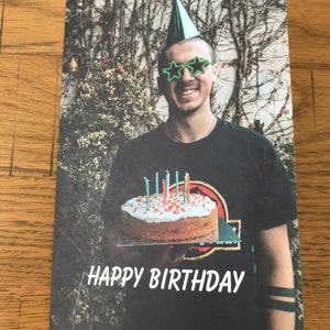 Funny Birthday Cake. Man in Party Hat Holding Birthday Cake
