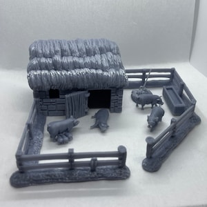 May include: A miniature gray farm scene featuring a barn with a thatched roof, a pig pen, and several small pig figurines. The scene includes a feeding trough and a wooden fence, creating a detailed farmyard setting.