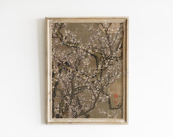 May include: A framed vintage print of a blossoming tree, likely a plum or cherry, in a traditional Asian style. The artwork features delicate white flowers against a muted brown background, with a red seal and text in the lower right corner.