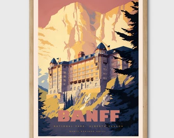 May include: A vintage travel poster featuring a mountain landscape with a large hotel building in the foreground. The poster is titled "Banff National Park. Alberta. Canada." and features the text "Banff Springs Hotel" at the bottom. The poster is in a light brown frame.