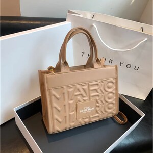 Buy Latest Marc Jacobs Bags Online in India at Upto 45% Off